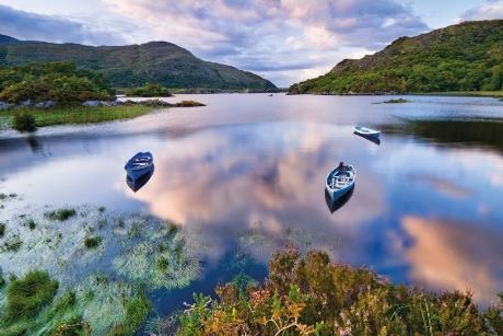 Boats on water in Killarney National Park